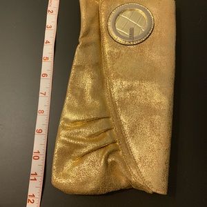 Guess gold underarm clutch